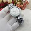 New Fashion Luxury Design Style Men /Woman Watches Stainless Steel Quartz Watch Femme Montre Clock Relojes De Marca Watch Gift