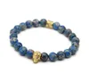 Neues Design, hochwertiger Schmuck, 8 mm große blaue Meeressediment-Steinperle mit bronzefarbenem Gold- und Silber-Totenkopf-Armband