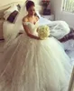 Princess Ball Gown Bröllopsklänningar från axeln Puffy Lace Tulle Bridal Gowns Custom Made High Quality Big Gown