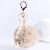 Fur Ball Fluffy Round Ball With Crown Pearl Strip Rose Guld Pläterad Metall Keychain Keyring Bil Nyckel Kedjor Handväska Charms Kvinnors Tjejs gåva