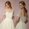 Nieuwe Collectie Bruids Wraps Beaded Lace Applique Sjaal Bruidsjas Backless Korte Mouw Mooie Bruiloft Jas