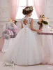 2016 مصغرة فساتين الزفاف مع جوهرة الرقبة و ثقب المفتاح عودة يزين تول ballgown الفتيات الأولى بالتواصل أثواب
