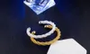 10 pcs/lot cadeau chaud prix usine 925 bracelet à breloques en argent personnalité lignes torsadées bracelet en or 18 carats bijoux de mode 1826