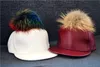 가죽 야구 모자 Pom Pom Real Fur Hats 하라주쿠 스타일의 조정 가능한 Snapback 여성을위한 패션 모자 무료 배송