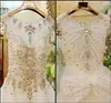 Luxury Crystal Bright Diamond Sexig bröllopsklänning Bollklänning Tulle Sheer Neck Lace Court Train Wedding Bridal Gowns With Big Bow