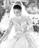 Charmig Mini-High-Hals Dubai Bröllopsklänningar Beaded Floral-Appliques Långärmade Organza Brudklänningar Glamorösa Kapell Tåg Bröllopsklänning