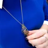 Groothandel-duurzame vrouwen mode metalen ketting dames meisjes vintage punk gotische schedel hand hanger lange ketting ketting