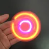 Hot Spinner Toy + Bluetooth Speaker Spinner LED Flash Light Hand Spinner Tri Cube Fluorescerande barn Vuxen gyroskopfinger med paket