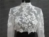 Real Po High Neck Long Sleeve Bridal Jacket Lace Appliced ​​Tulle Wedding Party Dress Sheer Wraps Bolero med täckta knappar CU5547519