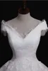 Foto reali Abito da ballo Abiti da sposa Pizzo Tulle Principessa Corsetto Indietro Paese Abiti da sposa occidentali Spalle Robe De Mariee