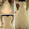 Immagine reale Abiti da sposa Top con balze di alta qualità Collo a cuore Senza maniche Gonna con volant Corsetto con lacci Indietro Abiti da sposa in organza Personalizzato