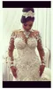 Dubai High-neck sjöjungfru bröllopsklänningar Brudklänningar Sheer Långärmade Baded Lace Applique Bröllopsklänning Sexig Tulle Lång Bridal Dress