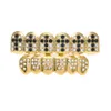 New Gold Plated Iced Out Black CZ Strass Hip Hop Denti per bocca GRILLZ Caps Top Bottom Grill Set Denti da vampiro