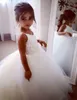 Leuke vintage bloem meisje jurken kant tule flowergirl jurk spaghetti riemen mouwloze gezwollen pageantjurk heilige communie jurken voor meisjes