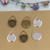 Boyute 40st 12mm Waterdrop Shaped Cabochon Base Inställning Antik Bronsilver Pläterad Hängsmycke Bezel Blank Bricka DIY Smycken Tillbehör