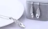 Conjuntos de joyería de plata nupcial Nueva moda Pendientes de diamantes de imitación de cristal con forma de lágrima Colgantes Conjuntos de collares Mujeres Niñas Joyería de boda de dama de honor
