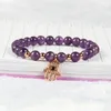 Nuovo design all'ingrosso 10 pz / lotto 6mm perline di pietra di cristallo viola naturale con bracciali di Hamsa a mano di Fatima gioielli di fascini delle donne della ragazza fine