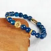 Topkwaliteit sieraden Groothandel 8mm Facet Blue and Black Agate Steen Kralen met Pvd Plated Lion Head Armbanden voor Mannen