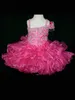 Glitz bébé fille Pageant robes 2017 avec Spaghetti cou jupe à volants Fuchsia infantile Pageant robe chasseur couleur courte