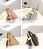 2017 spring new triangular women designer handbags Korean version tassel female makeup fashion chain oblique girls mini cross body bags