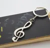 Anahtarlık anahtarlık gümüş kaplama nota anahtarlık araba metal müzik sembol anahtar zincirleri için
