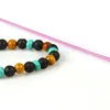 Nya Designs Beaded Armband Partihandel 10st / Lot 8mm Lava Rock Stone med Naturliga Gula Trä Pärlor Mode Armband