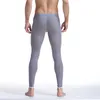 セクシーな男性メッシュのアンダーシャツ透明なエロティックな超薄いゲイロングジョンズアイスシルクレギンスパンツタイツカジュアルパンツマンパンティーシアー