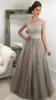 2017 Elegant Silver Gray Evening Dresses Off Shoulder Cap Sleeves Crystal Beaded Tulle Puffy Saudi Arabic Formal Evening Gowns Pro205p