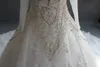 Modesta immagine reale collo alto lusso abiti da sposa perline cristalli perline appliques in pizzo illusione maniche lunghe abiti da sposa con il treno