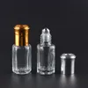 3ml 6ml 10ml åttkantigt glasflaskor med rulle på aromflaskor metallboll parfym eteriska oljepaketflaskor påfyllningsbart fall za1623