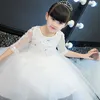 Elegancki Kwiat Dziewczyna Biała Koronkowa Suknia Ślubna Cekiny Aplikacje Party Tulle Princess Birthday Dress Half Sleeve First Communion Suknia