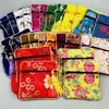 High End Small Zipper Coin Purse Silk Brocade Fabric Jewelry Presentväskor Tassel Armband Lagring Pouch Wedding Party Favor 50st Lot189T