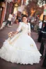 2021 مثير الذهب الأبيض الكرة ثوب فساتين quinceanera مع التطريز مطرز الحلو 16 اللباس الدانتيل يصل الطابق طول vestido دي فيستا BM80