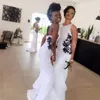 2017 African Style White Chiffon Mermaid Bridesmaid Dresses Long With Black Lace Appliqued Criss Cross Back Bow Maid Of Honor Gown EN71910