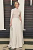 Eleganckie Sukienki Koronkowe Ivory Evening Wear z Cape High Neck Kombinezon Cekinowane Suknie Prom Długość Formalne Garnitury