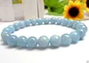 Neue 10mm hellblau Aquamarin Edelstein Runde Perlen elastische Armband 7,5 "