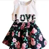 Baby Girls Kleidung Liebe Tops + Blumenrock 2pcs hübsche blühende Baumwollkinder Sets Sommer Kinder Mädchen Kleidung Set