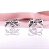 HOTSELL AUTHENTISK 925 STERLING SILVE KVINNER ÖVNINGAR FLOPPLING BOW CLEAR CZ STUD EARRINGS COURTIBLE EUROPELT STYLE SMEYCHE 290555CZ