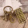 Exquisite Mini Brons Roestvrijstalen Sleutelhanger Personalized Creative Retro Sleutelhanger Pendant Kr031 Sleutelhangers Mix Order 20 stuks veel