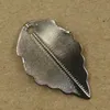 Boyute 100pcs 7 färger 10 * 17mm 16 * 25mm Hot Sale Leaf Charm Metal Mässing Scrapbooking Stämpling DIY Smycken Tillbehör