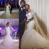 2022 Vintage Sexy African Mermaid Wedding Dresses Long Sleeves Sweetheart Lace Appliques Crystal Beaded Plus Size Court Train Formal Bridal Gowns