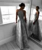 Staal grijs hi-lo prom jurk mode halslijn kant applique mouwloze rits backless feestjurk elegante a-lijn mooie vrouwen avondjurken