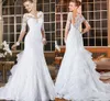 Długie rękawy Koronki Syrenki Suknie Ślubne 2017 Bling Romantic Aplikacje Koronki Bridal Dresses Button Back Vestido de Noiva 2017 Spring Fall