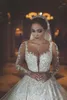 2018 Retro Sheer Neck Illusion Long Sleeves Wedding Dresses With Lace Applique Beaded Arabic Bride Wedding Gowns5854345