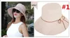 Gorąca wyprzedaż moda Ultraviolet Solding Solding Busket Bowk Nie szeroki rdzeń czapka Summer Women Beach Hat M028