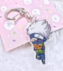 Gut ein Anime -Acryl -Doppelanhänger Keychain KR188 Keychains Mix bestellen 20 Stück pro Lot3401995