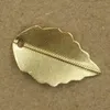 Boyute 100pcs 7 färger 10 * 17mm 16 * 25mm Hot Sale Leaf Charm Metal Mässing Scrapbooking Stämpling DIY Smycken Tillbehör