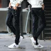 Мода 2017 года. Подростковые эластичные облегающие черные и синие пуговицы. Дизайнерские повседневные джинсы для мальчиков в стиле хип-хоп. Городская уличная одежда. Мужские брюки-карандаш325g.