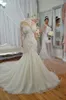 Dubai High-Neck Mermaid Wedding Dresses Bridal Gowns Sheer Long Sleeves Beaded Lace Applique Wedding Gown Sexy Tulle Long Bridal Dress