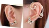 Boucles d'oreilles à breloques manchettes d'oreille Punk cristal plaqué argent strass papillon oreille os Clips boucles d'oreilles gothiques